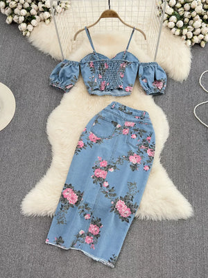 Denim sweetheart cami with off-shoulder sleeves and floral print skirt set.