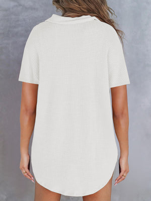 White waffle knit polo shirt with button detail and short sleeves