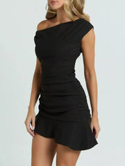 Black one-shoulder mini dress with asymmetrical ruffle hem and ruched detail