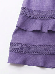 Purple mini dress with tiered ruffles and lace trim detail
