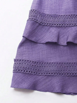Purple mini dress with tiered ruffles and lace trim detail