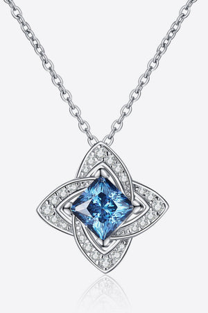 Sky blue moissanite and diamond pendant necklace with floral design