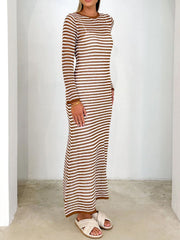 Caramel and white striped maxi sweater dress with long sleeves and a crew neck.