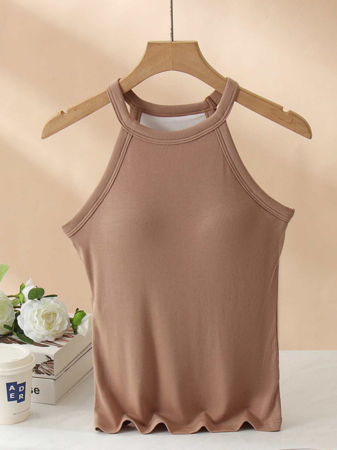 Camel ribbed halter tank top with built-in bra and lettuce hem.