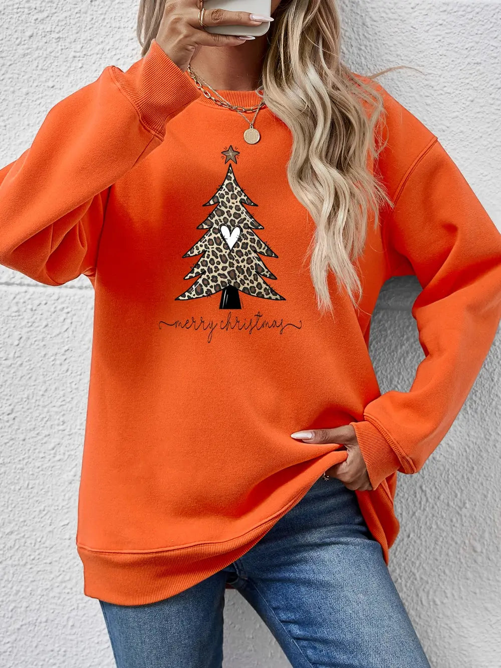 Orange Leopard Tree Graphic Sweatshirt with Merry Christmas text