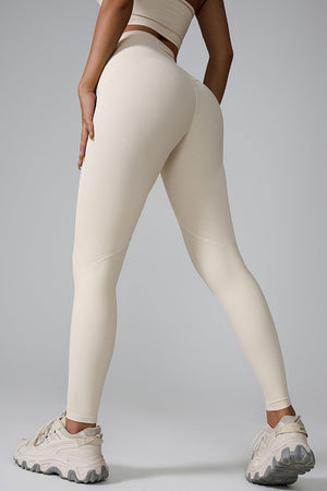 Ivory ribbed contour leggings with a high waist and seamless design.