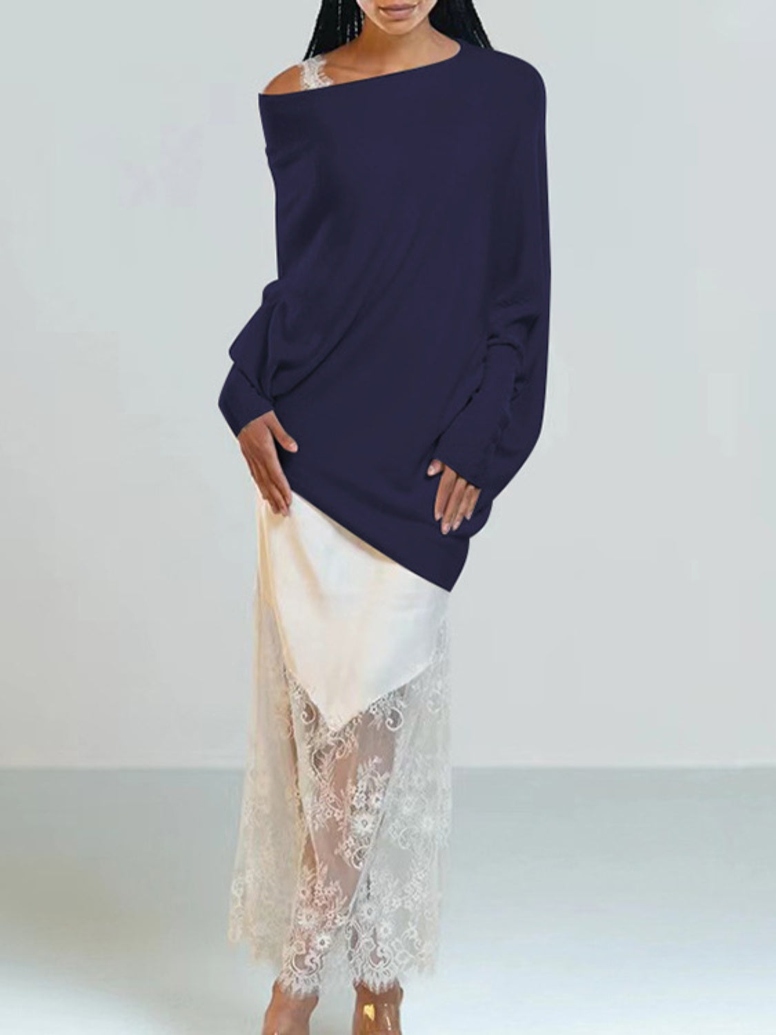 Dark Blue off-shoulder knit sweater with textured cuffs and lace trim detail.