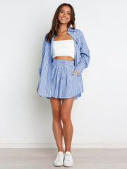 Oversized blue and white striped shirting set with drawstring shorts and a white crop top.