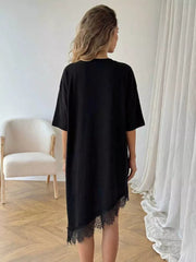 Black asymmetrical t-shirt dress with lace trim hem detail