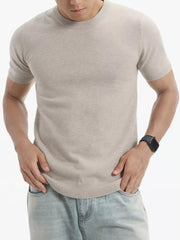 Men's khaki knit crew neck undershirt with short sleeves and ribbed hem.
