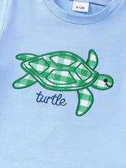 Children's Turtle Round Neck Top And Gingham Shorts Set, close-up detail