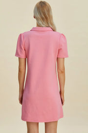 Pink textured short sleeve mini dress with geometric pattern and collar