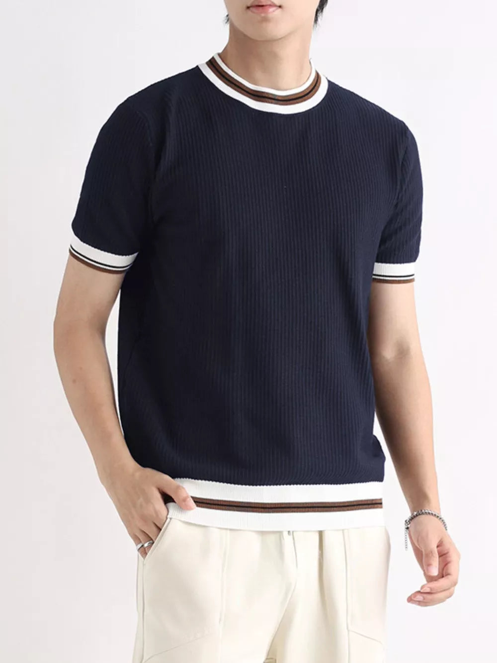 Men's navy ribbed crew neck t-shirt with white and brown striped trim on collar and cuffs.