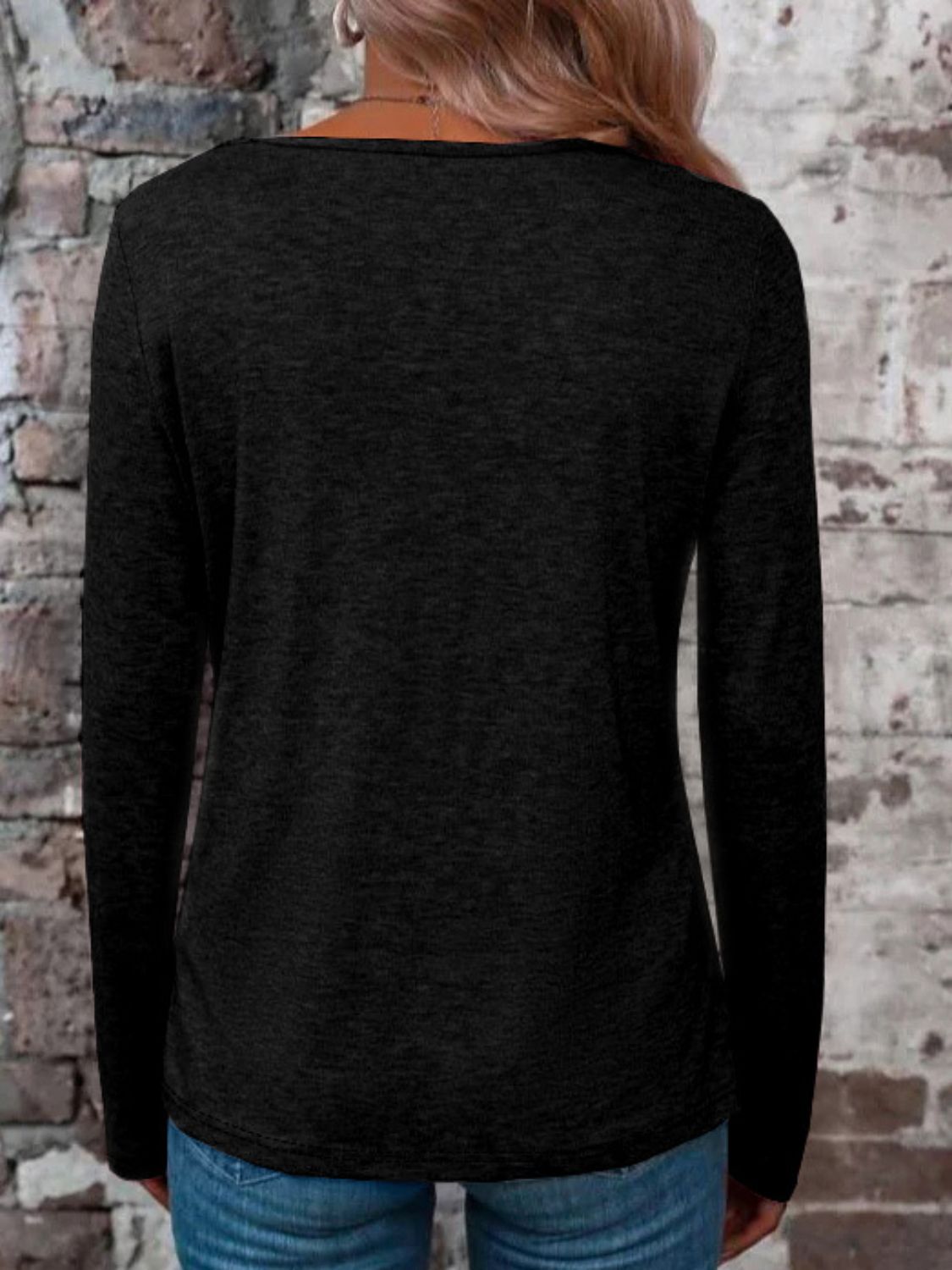 Black long sleeve t-shirt with a lattice neckline detail.