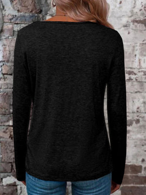 Black long sleeve t-shirt with a lattice neckline detail.