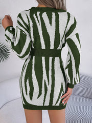 Zebra stripe knit fit-and-flare dress in army green with long sleeves and a cinched waist.