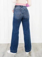 Medium wash denim wide leg jeans with utility pockets and a high rise.