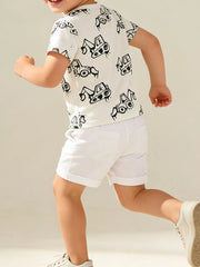 White cotton t-shirt with playful black excavator print, short sleeves, crew neck.