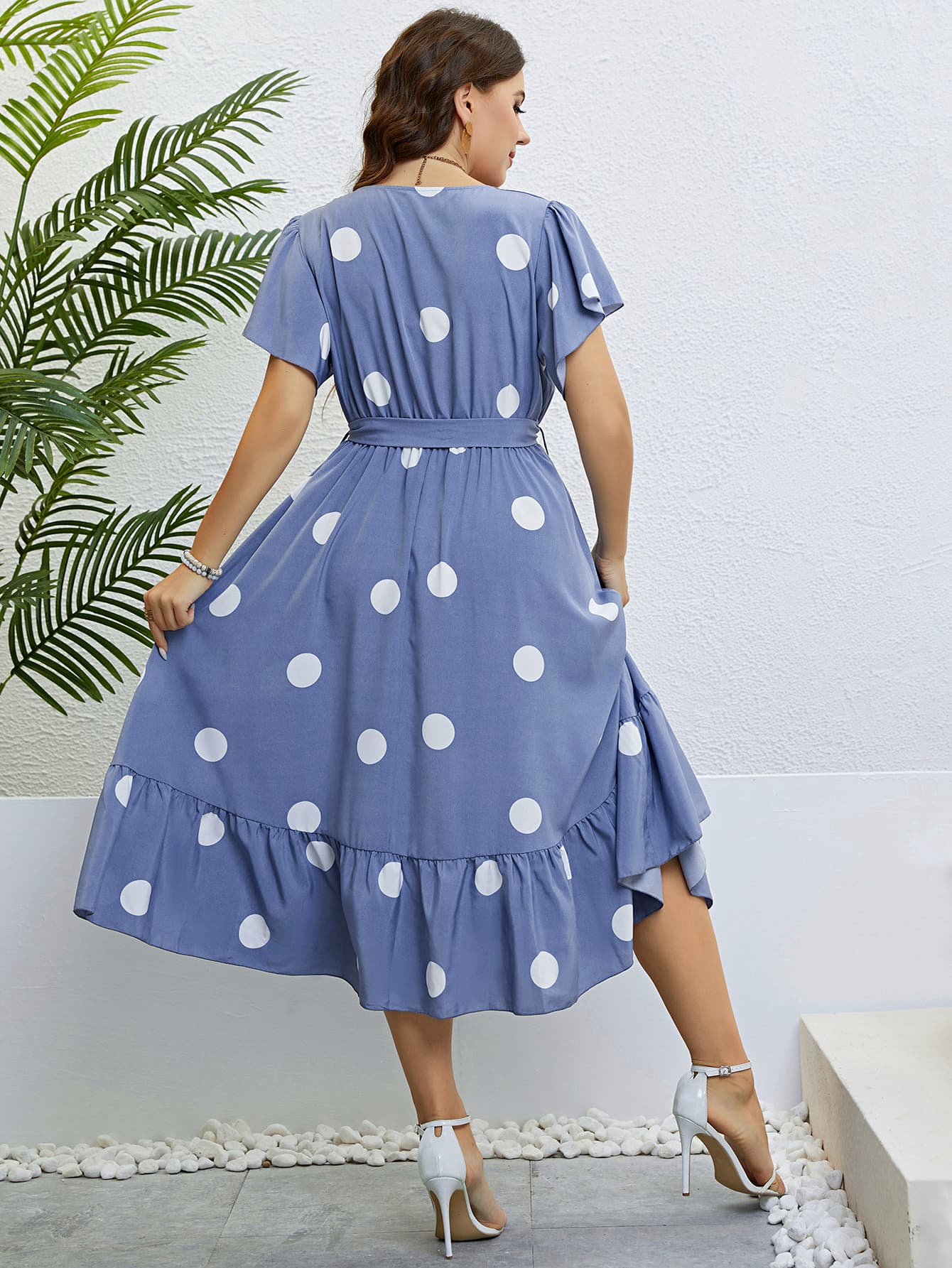 Cerulean polka dot midi dress with flutter sleeves and ruffled hem