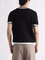 Black ribbed crew neck t-shirt with striped trim on sleeves and neckline