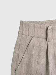 Camel wide-leg pants with herringbone pattern and pleats