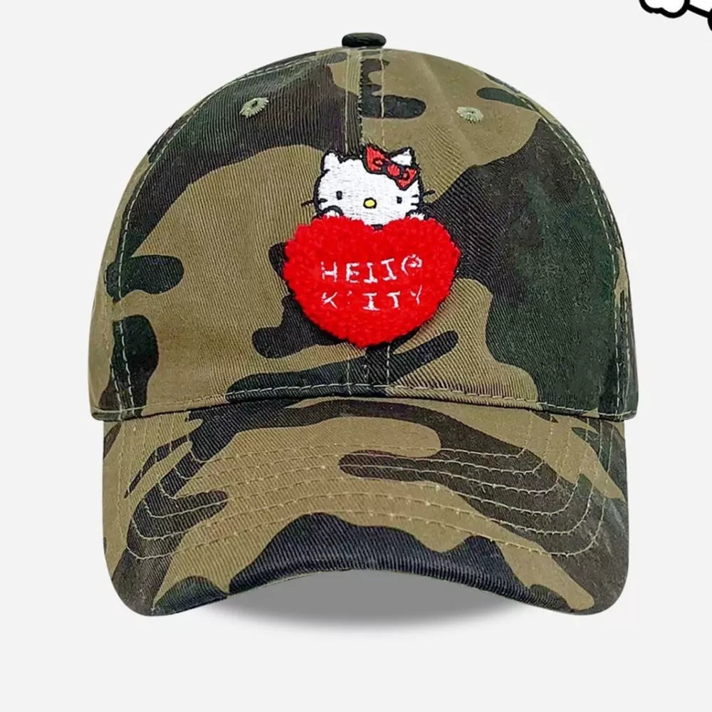 Hello Kitty embroidered cotton baseball cap in camouflage with red heart detail.