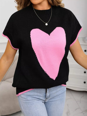 Black knit top with pink heart graphic, crew neck, short sleeves, and ribbed trim.