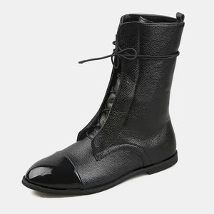Black leather lace-up ankle boots with patent cap-toe detail