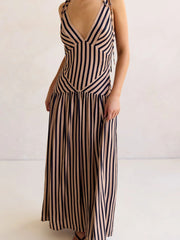 Tie-shoulder maxi dress with V-neck in brown and navy stripes, featuring adjustable straps.