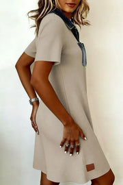 Ribbed knit mini dress in beige with short sleeves, a denim collar, and a chest pocket detail.