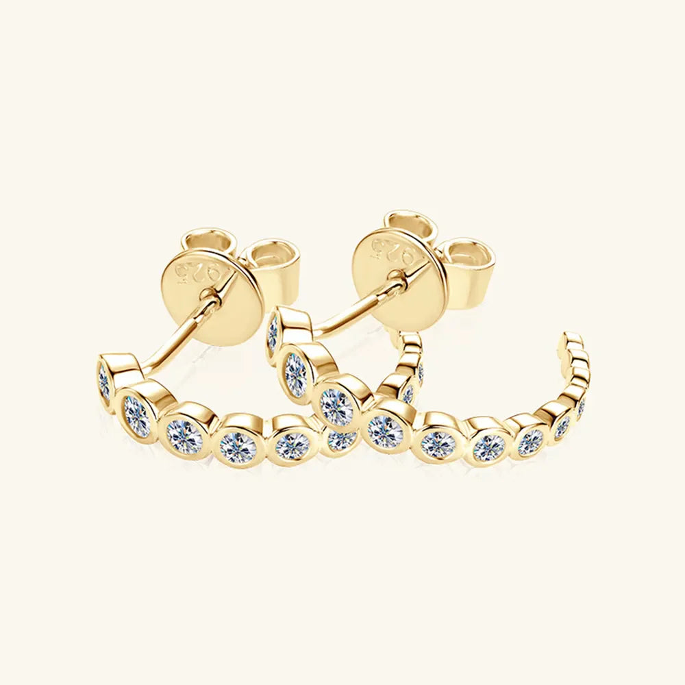 Gold moissanite pavé hoop earrings with bezel-set stones