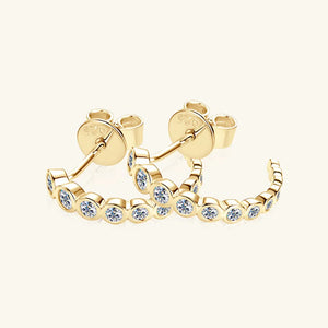 Gold moissanite pavé hoop earrings with bezel-set stones