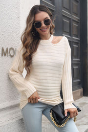 Ivory ribbed knit sweater with asymmetric shoulder detail and horizontal stripes.