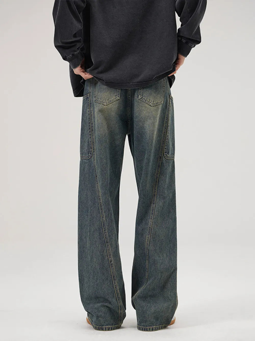 Relaxed fit washed wide-leg jeans in Vintage Blue denim with a baggy cut.