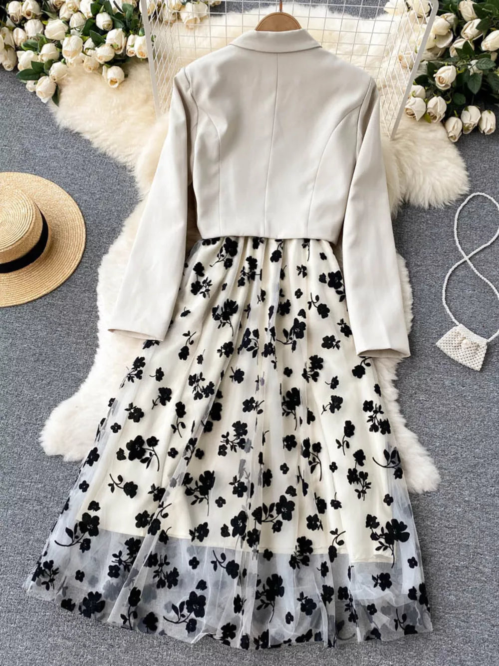 Maternity midi dress with black floral overlay and matching blazer.
