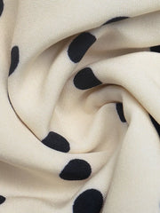 Apricot polka dot mini dress fabric detail