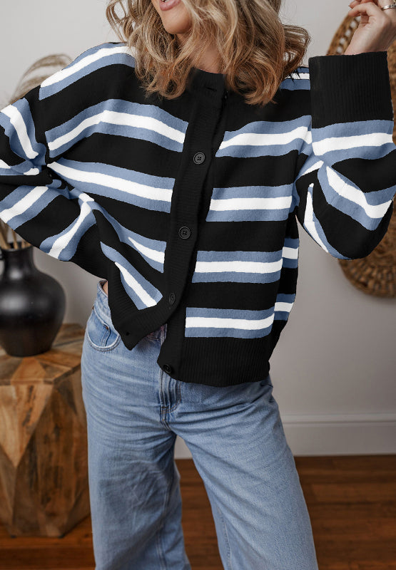 Black and pink striped knit cardigan with button front and crew neck.