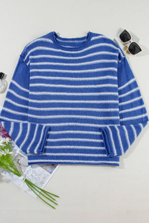 Blue and white striped relaxed fit knit sweater with crew neck and textured acrylic fabric.