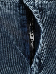 Blue corduroy cargo pants with a zipper detail and textured fabric.