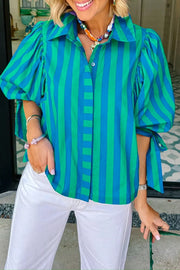 Puff sleeve button-up shirt with blue and green vertical stripes, cotton fabric, and tie cuffs.
