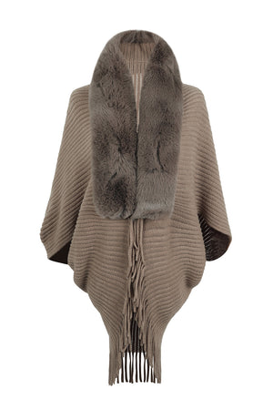Faux fur collar knit cape in taupe with fringe detail and open knit sleeves.