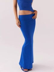 Blue maternity maxi skirt with a flattering mermaid hem and ruched detail on the matching top.