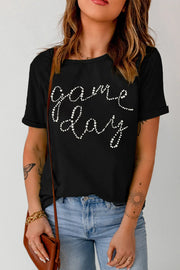 Black t-shirt with white dot "Game Day" graphic, crew neck, short sleeves