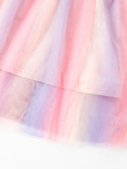 Toddler tulle dress with pastel rainbow tie-dye pattern and layered skirt.