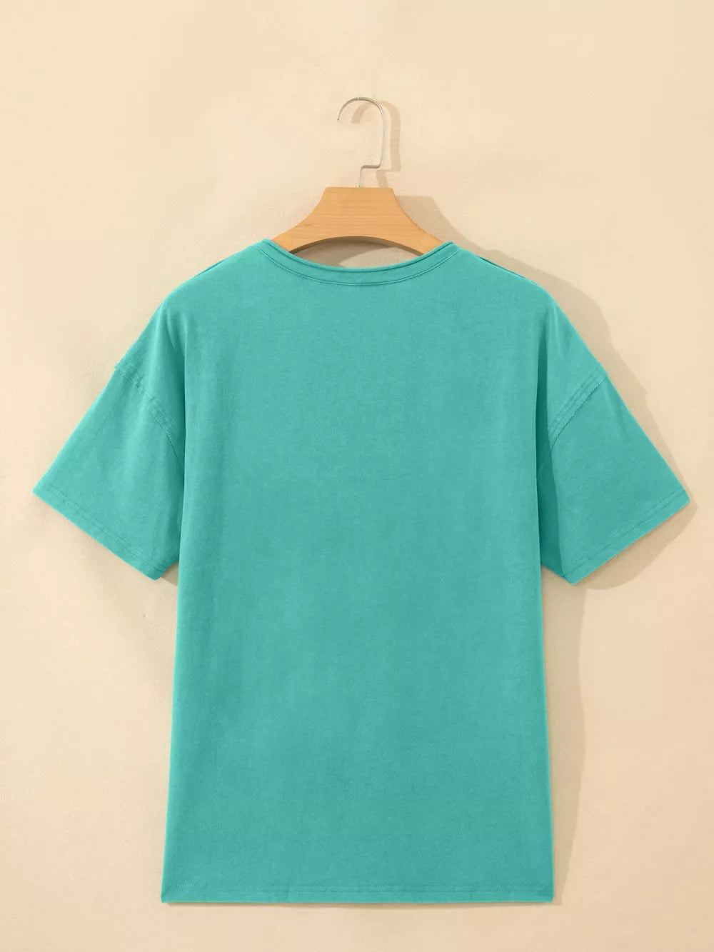 Teal mineral wash cotton tee with short sleeves and crew neck.