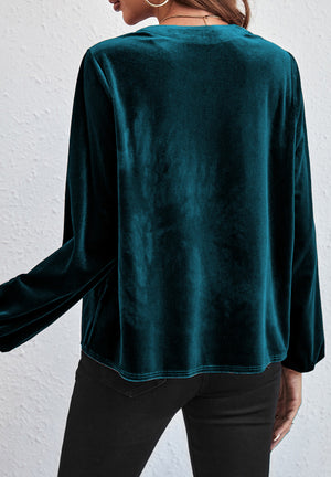 Gathered velvet henley blouse in deep teal with long sleeves and a relaxed fit.