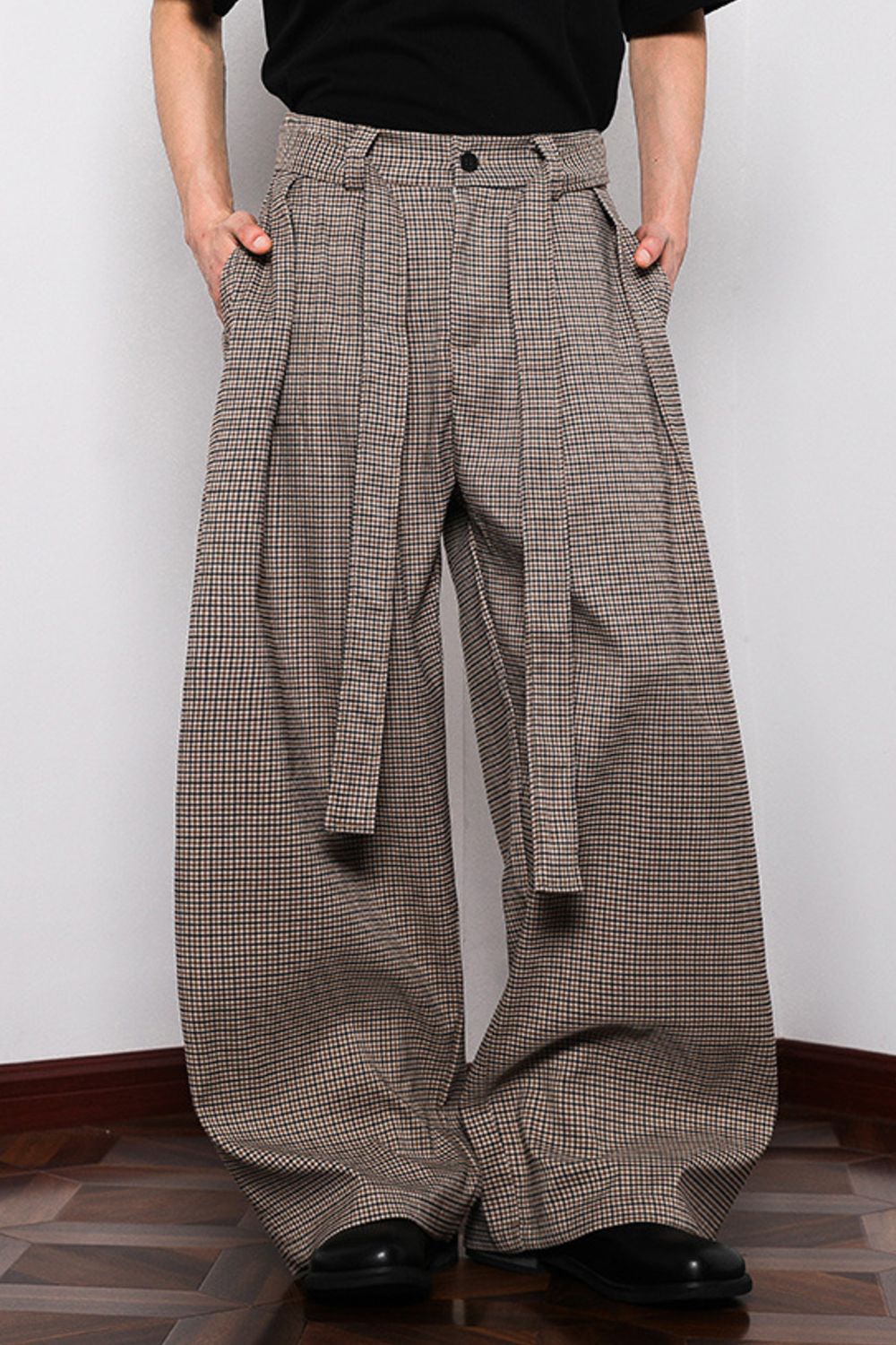 Men's belted wide leg plaid sweatpants in brown with a casual fit.