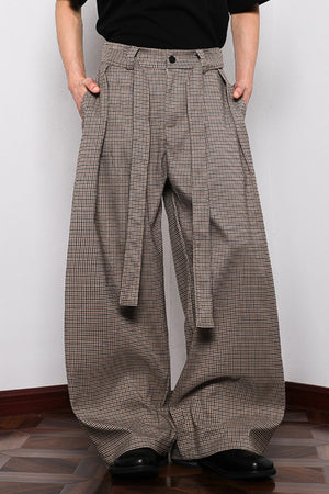 Men's belted wide leg plaid sweatpants in brown with a casual fit.