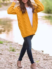 Gold cable knit duster cardigan with textured pattern and open front