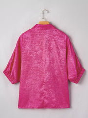Maternity collared V-neck metallic shirt in deep rose polyester with puffed sleeves.